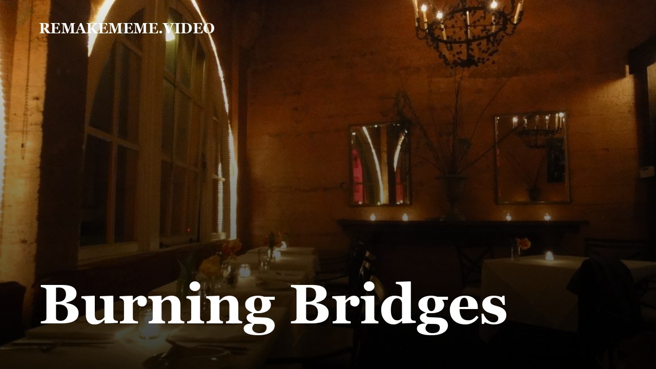 A long dinner table under warm light, the stand-in image for the Burning Bridges format